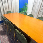 Elegant 8-Seater Wooden Dining Table Set with Green Velvet Upholstered Chairs (Natural Wood & Metal Legs) | Used Dining Set & Pre-Owned Furniture