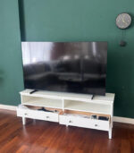 Classic White IKEA TV Stand & Media Console with Open Shelves and Black Knob Drawers | Used TV Table & Pre-Owned Furniture - Image 2